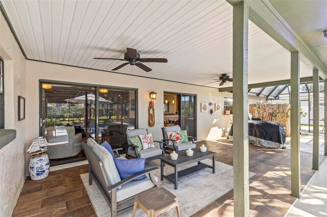 12 Bannerwood Ln, Palm Coast, FL 32137 - view of patio / terrace with ceiling fan and an outdoor hangout area
