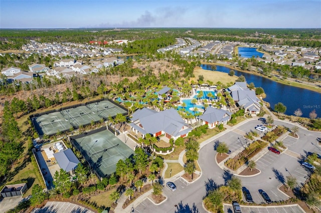 birds eye view of property featuring a residential view and a water view