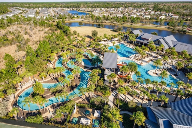 bird's eye view with a water view and a residential view