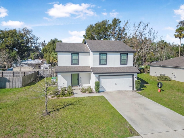 view of front of house with a front lawn and a garage