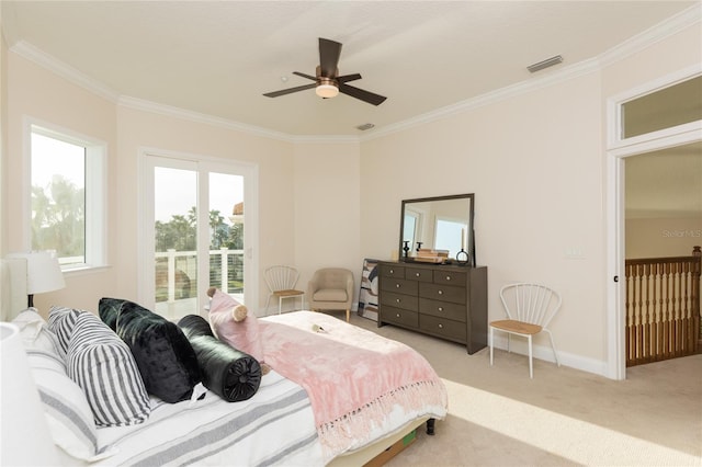 carpeted bedroom featuring ornamental molding, access to outside, and ceiling fan