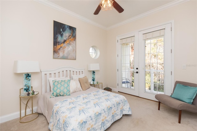 carpeted bedroom with multiple windows, access to exterior, ornamental molding, and french doors