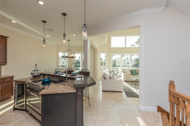 220 Harbor Village Pt N, Palm Coast, FL 32137 - kitchen with stainless steel range with electric stovetop, a breakfast bar area, recessed lighting, and ornamental molding