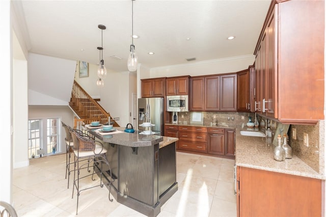 220 Harbor Village Pt N, Palm Coast, FL 32137 - kitchen featuring a kitchen breakfast bar, decorative backsplash, a sink, light stone countertops, and appliances with stainless steel finishes