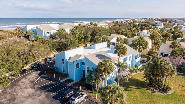 birds eye view of property featuring a water view and a residential view