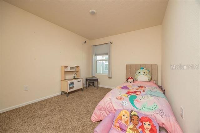 bedroom featuring carpet flooring