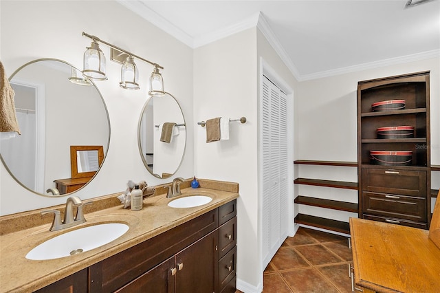 bathroom featuring tile patterned flooring, crown molding, and vanity