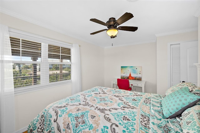 bedroom with ornamental molding and ceiling fan