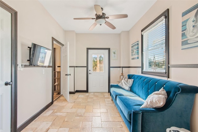 living room featuring ceiling fan