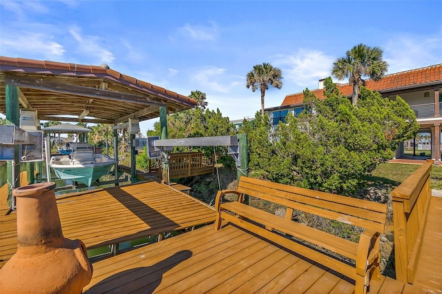 wooden deck featuring a dock