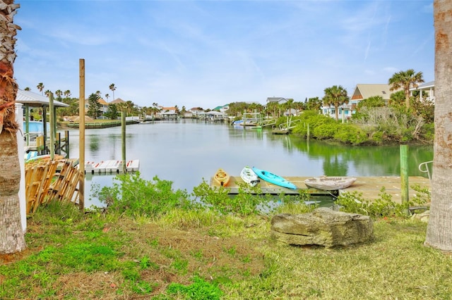 property view of water featuring a boat dock