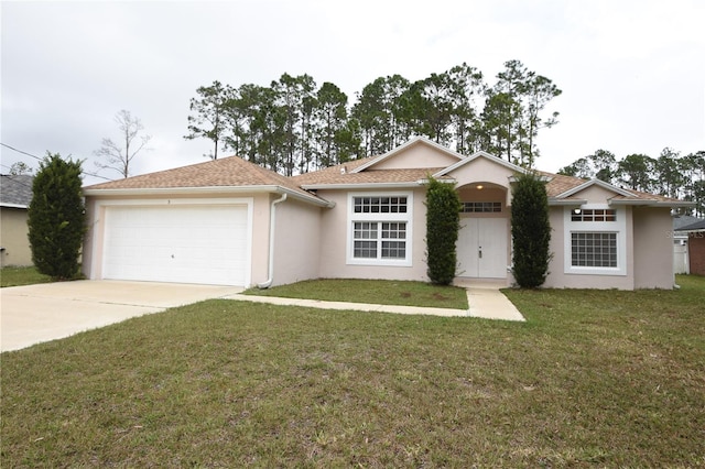 ranch-style house featuring an attached garage, stucco siding, concrete driveway, and a front yard