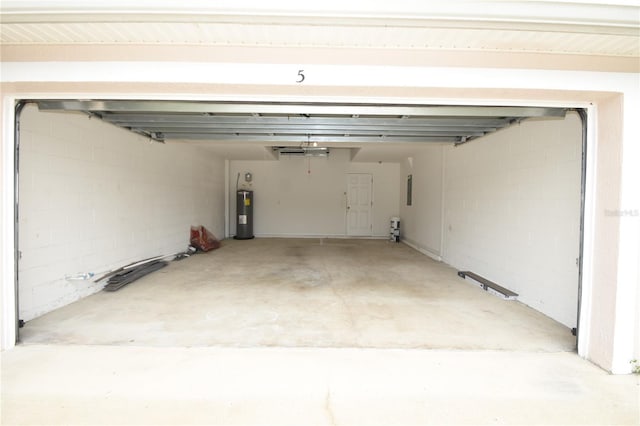 garage featuring water heater