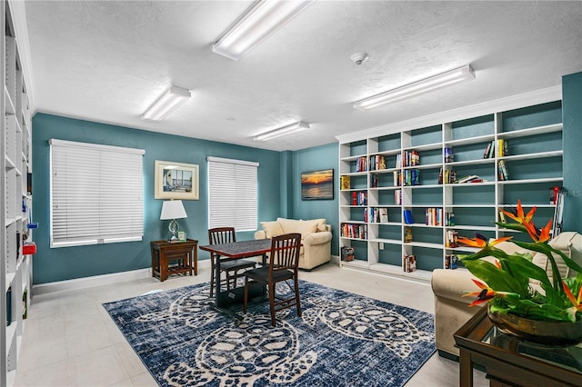 office area with a textured ceiling