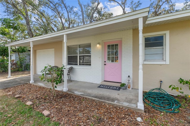 property entrance featuring a garage