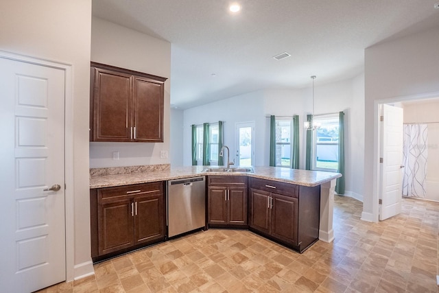 kitchen with visible vents, stainless steel dishwasher, a sink, dark brown cabinets, and a peninsula