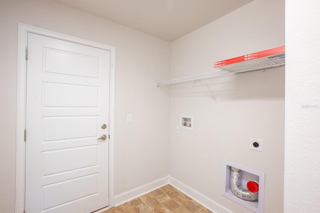 clothes washing area with baseboards, laundry area, washer hookup, and hookup for an electric dryer