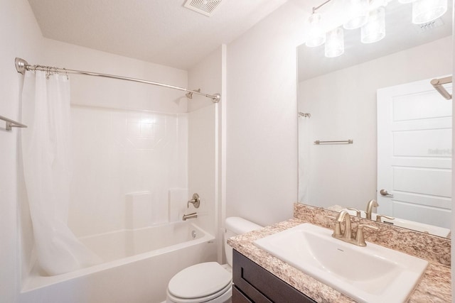 bathroom with toilet, shower / tub combo, visible vents, and vanity