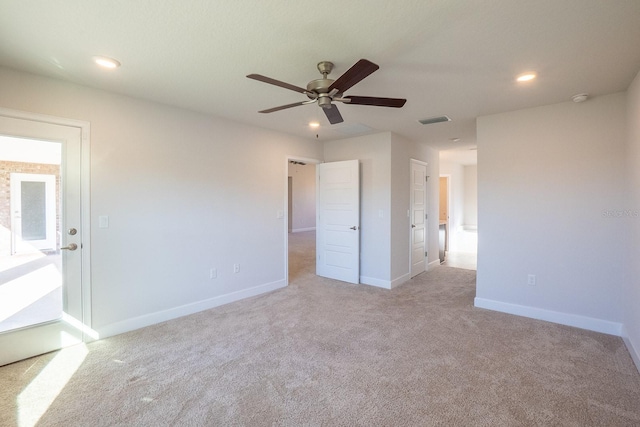 unfurnished bedroom featuring ceiling fan, recessed lighting, carpet flooring, visible vents, and baseboards