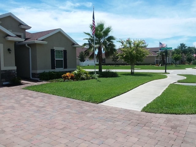 exterior space with a lawn