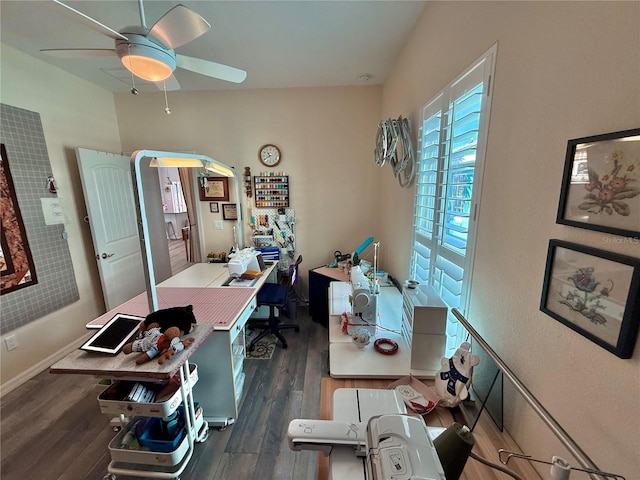 office with ceiling fan, baseboards, and wood finished floors