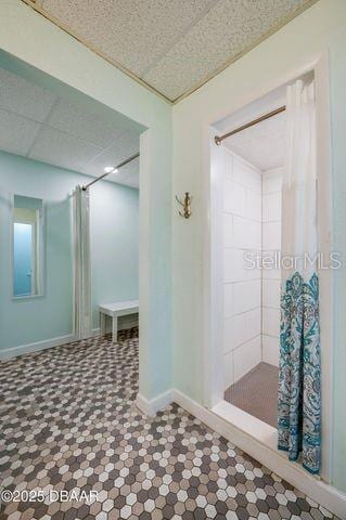 bathroom featuring tiled shower