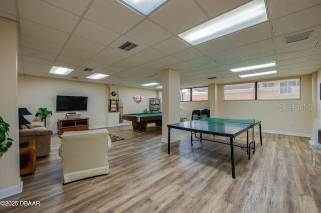 game room with a drop ceiling, pool table, and wood-type flooring