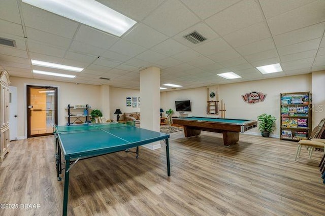 playroom with pool table, a drop ceiling, and light hardwood / wood-style flooring