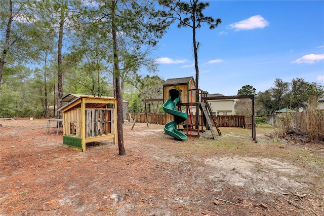 view of jungle gym with fence