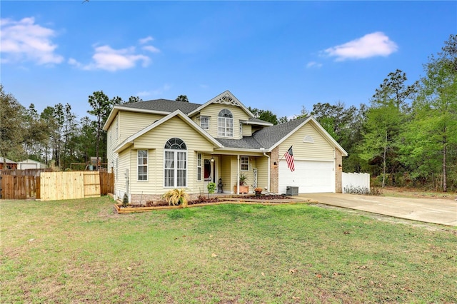 view of front of house with a garage, a shingled roof, concrete driveway, fence, and a front lawn