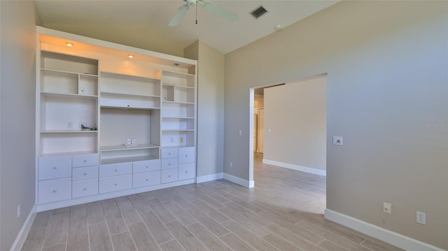 unfurnished bedroom featuring ceiling fan and light hardwood / wood-style floors