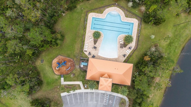 drone / aerial view with a water view