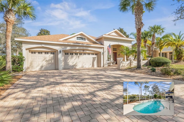 view of front of home featuring a garage