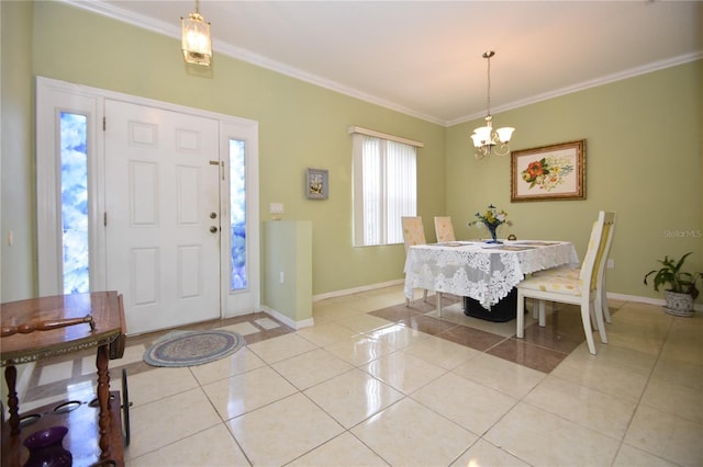 foyer entrance featuring light tile patterned floors, baseboards, an inviting chandelier, and crown molding