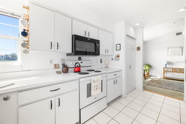 kitchen featuring white cabinetry, black microwave, light countertops, and white electric range