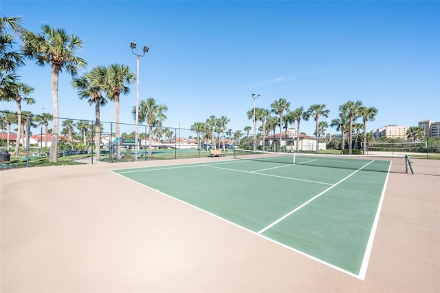 view of sport court featuring community basketball court and fence