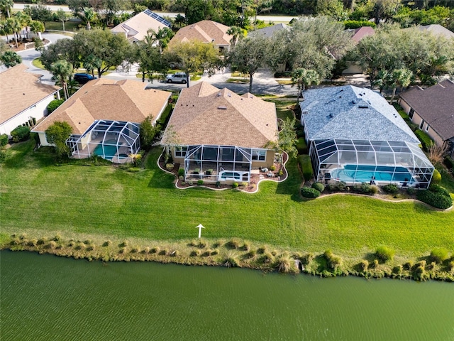 aerial view with a water view and a residential view