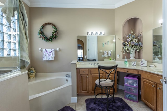 full bathroom featuring ornamental molding, tile patterned flooring, vanity, and a bath