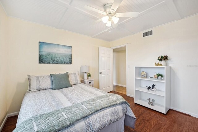 bedroom featuring dark wood-type flooring and ceiling fan