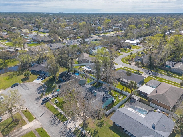 birds eye view of property with a residential view