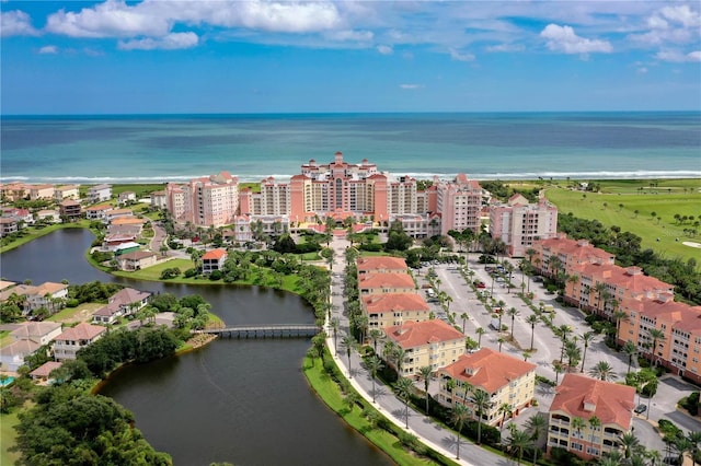 aerial view featuring a water view and a view of city