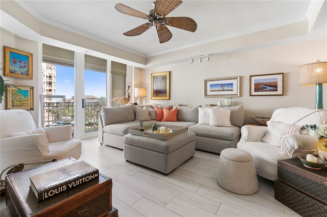 200 Ocean Crest Dr Unit 306, Palm Coast, FL 32137 - living area with a textured ceiling, ornamental molding, and a ceiling fan