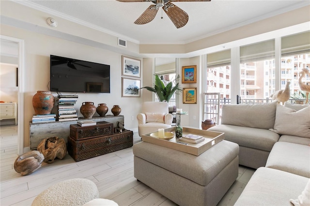 200 Ocean Crest Dr Unit 306, Palm Coast, FL 32137 - living room featuring light wood-style floors, ceiling fan, visible vents, and crown molding