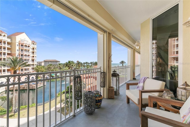 200 Ocean Crest Dr Unit 306, Palm Coast, FL 32137 - balcony featuring a water view