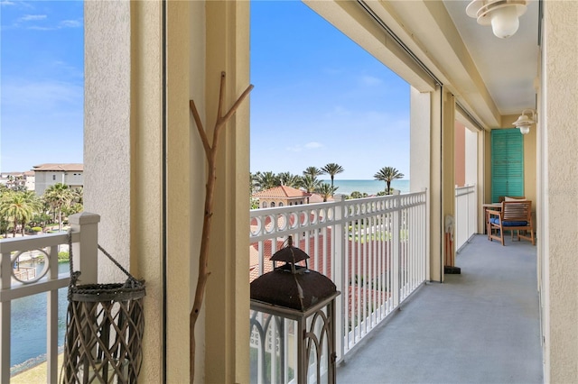 200 Ocean Crest Dr Unit 306, Palm Coast, FL 32137 - balcony featuring a water view and a grill