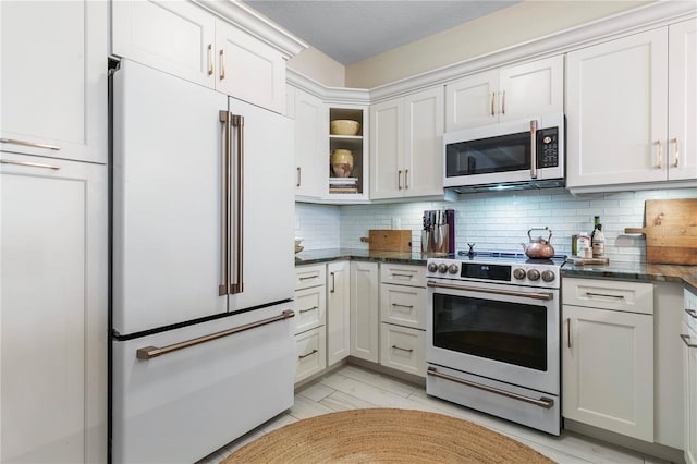 200 Ocean Crest Dr Unit 306, Palm Coast, FL 32137 - kitchen with white appliances, glass insert cabinets, and white cabinets