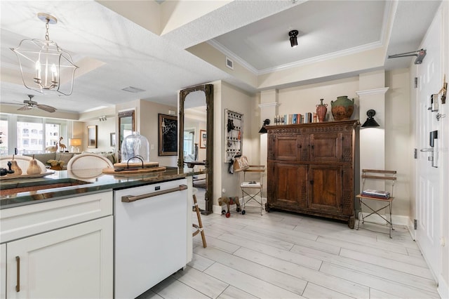 200 Ocean Crest Dr Unit 306, Palm Coast, FL 32137 - kitchen featuring decorative light fixtures, crown molding, dark countertops, open floor plan, and white cabinets