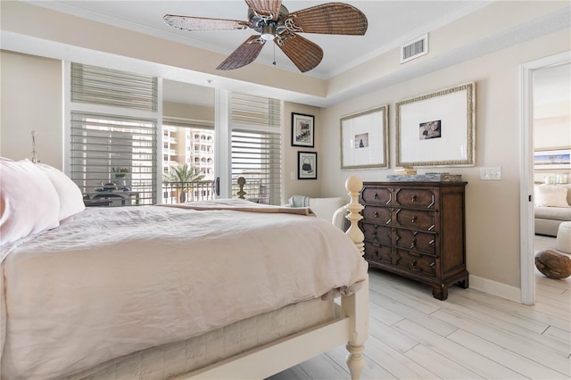 200 Ocean Crest Dr Unit 306, Palm Coast, FL 32137 - bedroom featuring visible vents, ornamental molding, a ceiling fan, light wood-type flooring, and baseboards