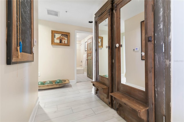 200 Ocean Crest Dr Unit 306, Palm Coast, FL 32137 - corridor featuring baseboards and visible vents