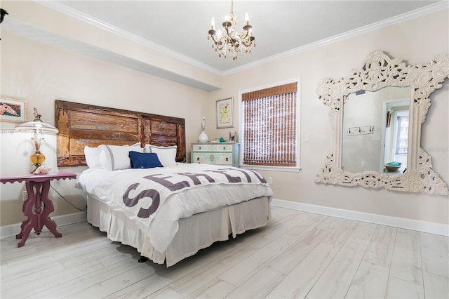 200 Ocean Crest Dr Unit 306, Palm Coast, FL 32137 - bedroom with baseboards, light wood-type flooring, a chandelier, and crown molding